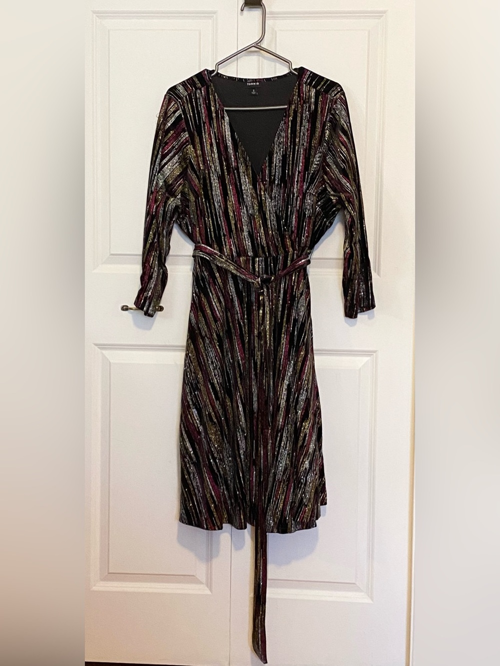 Torrid Black Faux Wrap Velvet Dress with Gold, Silver & Pink Metallic Stripes.